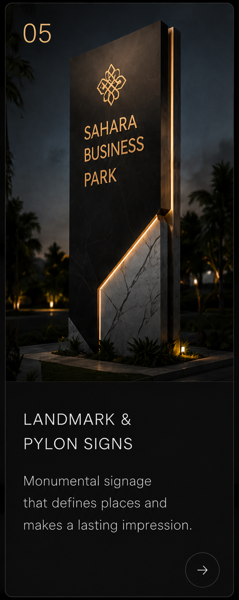Illuminated landmark and pylon sign in a landscape setting